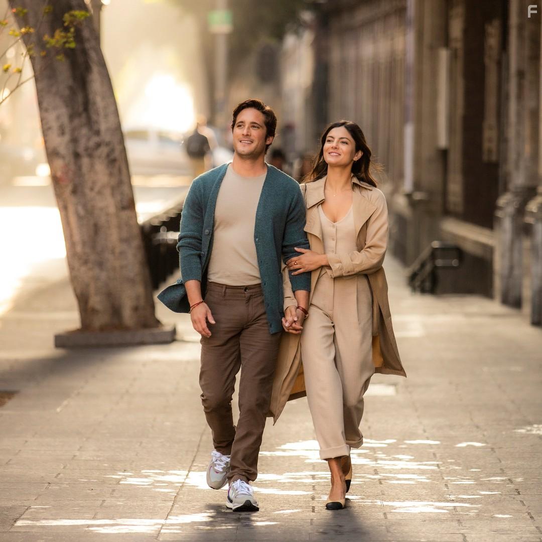 Diego Boneta and Monica Barbaro in At Midnight (2023)