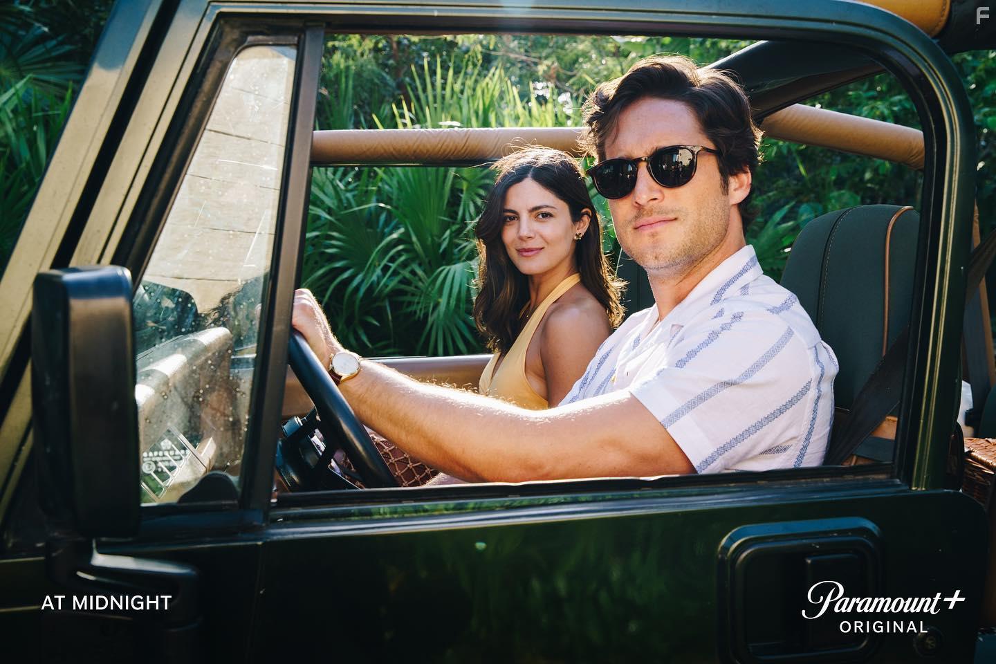 Diego Boneta and Monica Barbaro in At Midnight (2023)