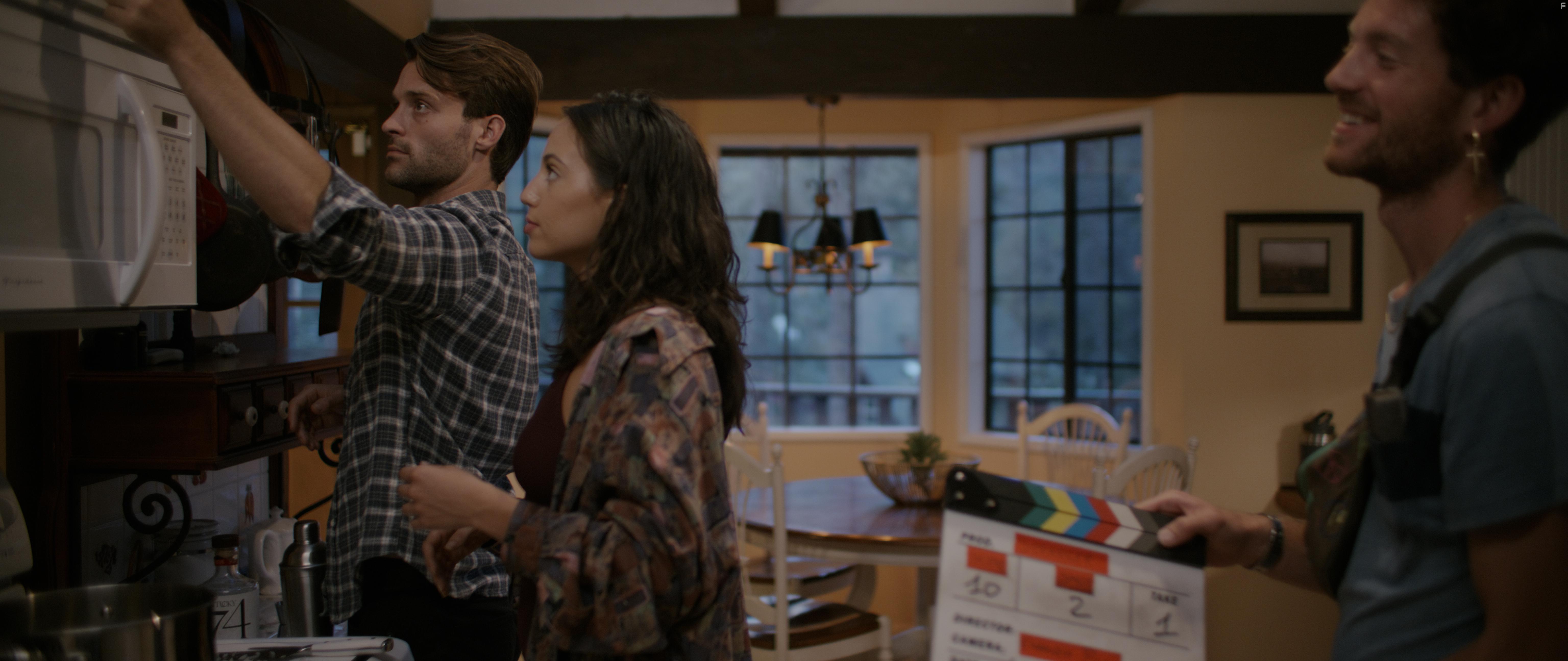 Giorgio Rossini, Taylor Jabara, and Jacob Taylor in Stranger (2022)