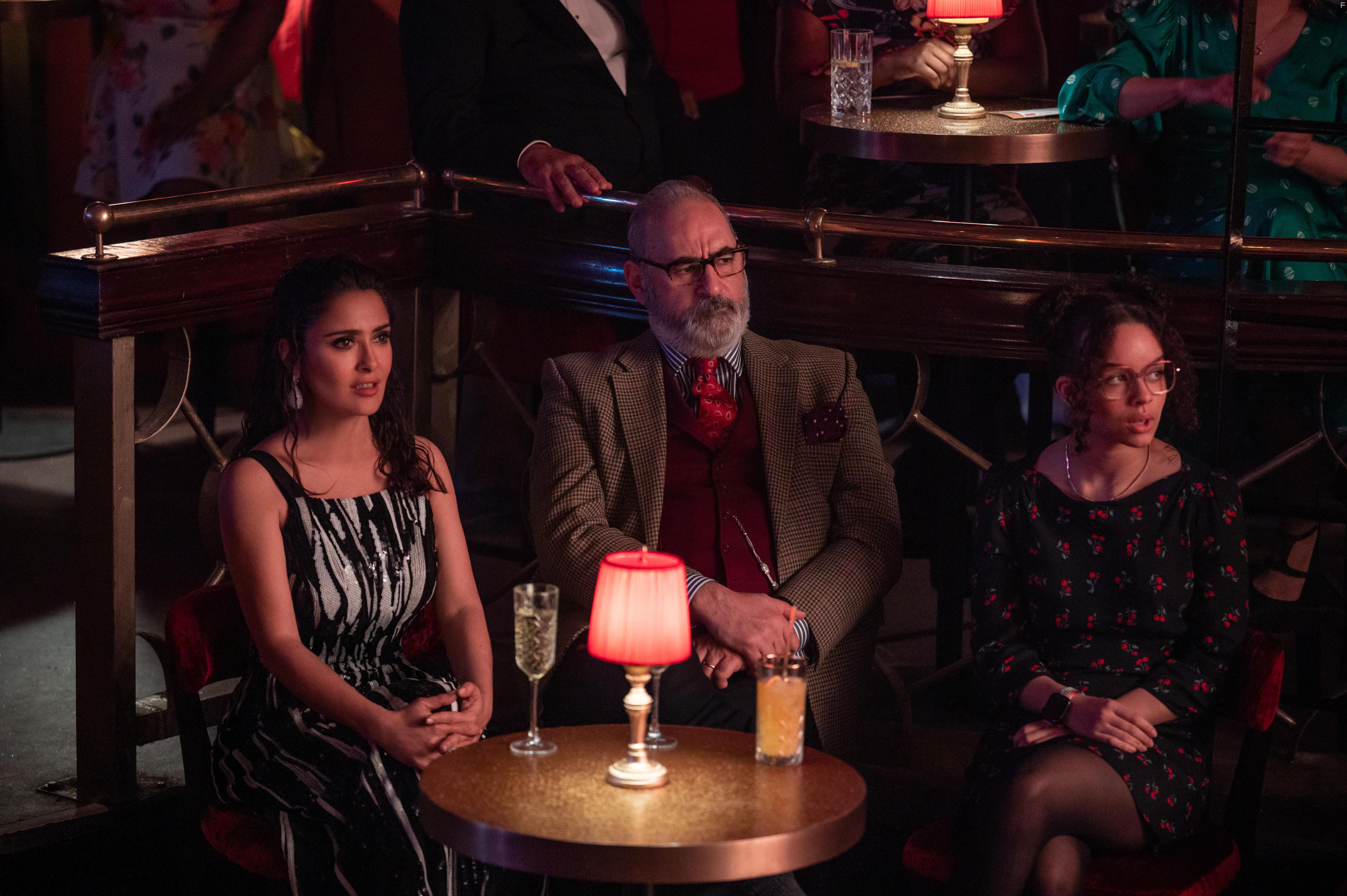 Salma Hayek, Ayub Khan-Din, and Jemelia George in Magic Mike's Last Dance (2023)