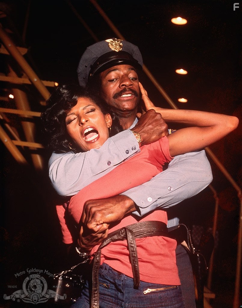 Pam Grier and Carl Weathers in Friday Foster (1975)
