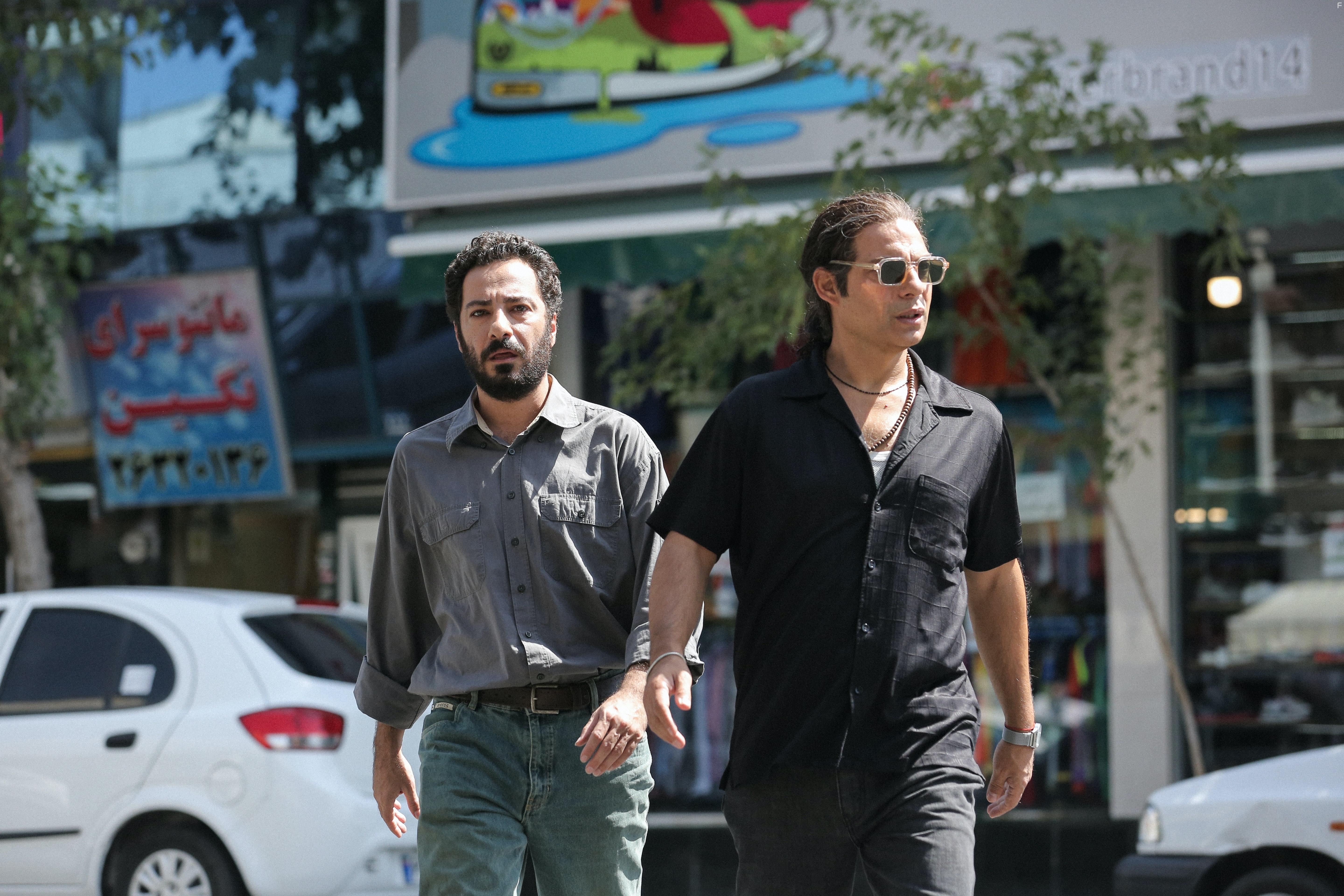 Payman Maadi and Navid Mohammadzadeh in Leila's Brothers (2022)