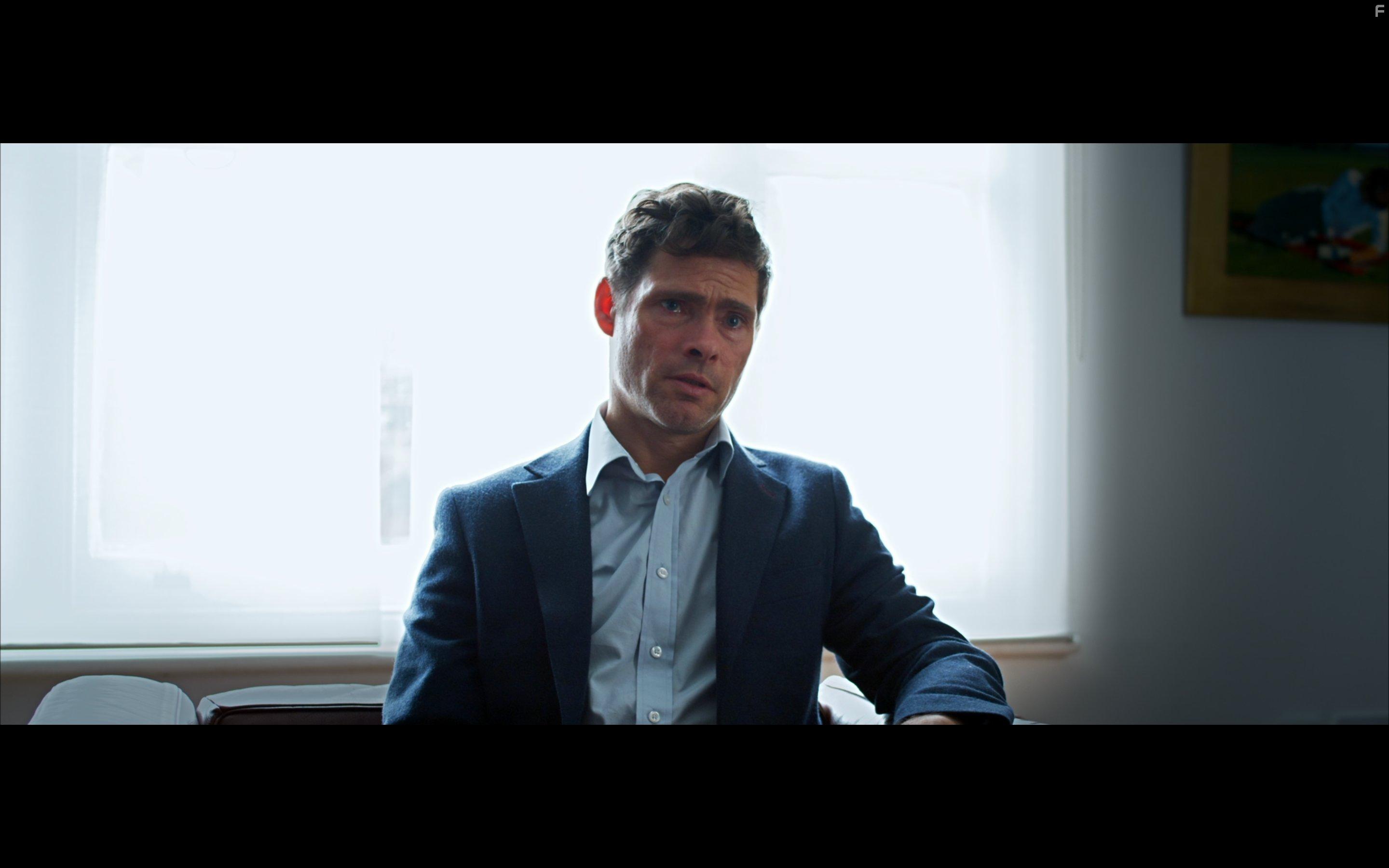 Alex Reece in The Consultant (2022)