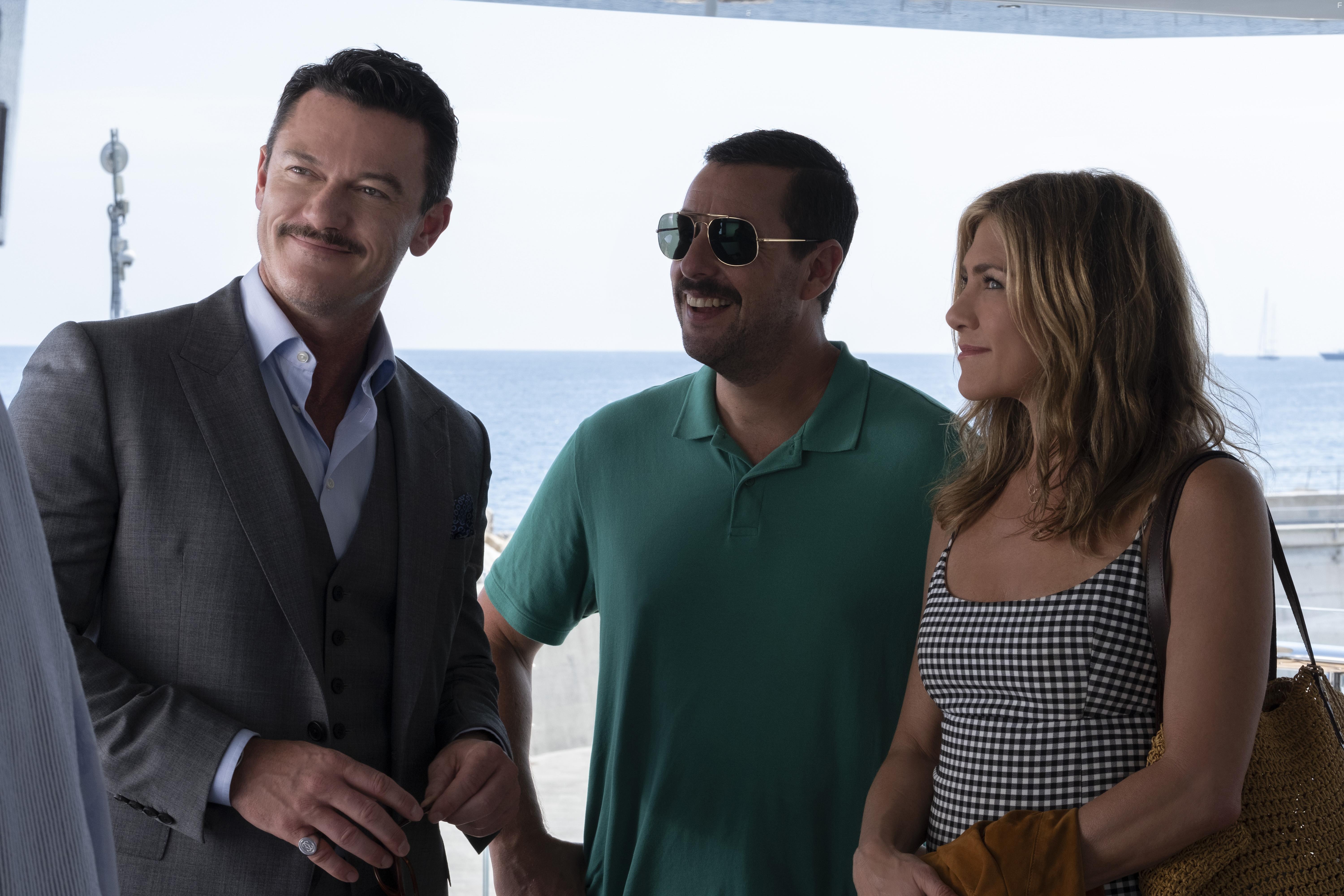 Jennifer Aniston, Adam Sandler, and Luke Evans in Murder Mystery 2 (2023)