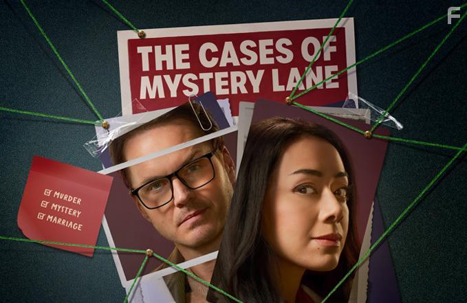 Aimee Garcia and Paul Campbell in The Cases of Mystery Lane (2023)