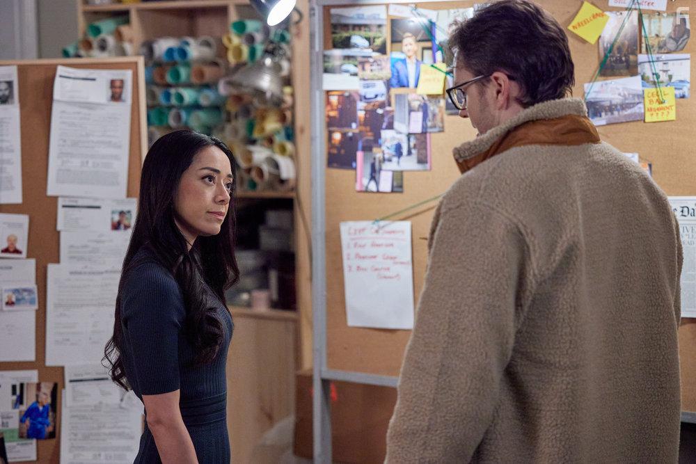 Aimee Garcia and Paul Campbell in The Cases of Mystery Lane (2023)