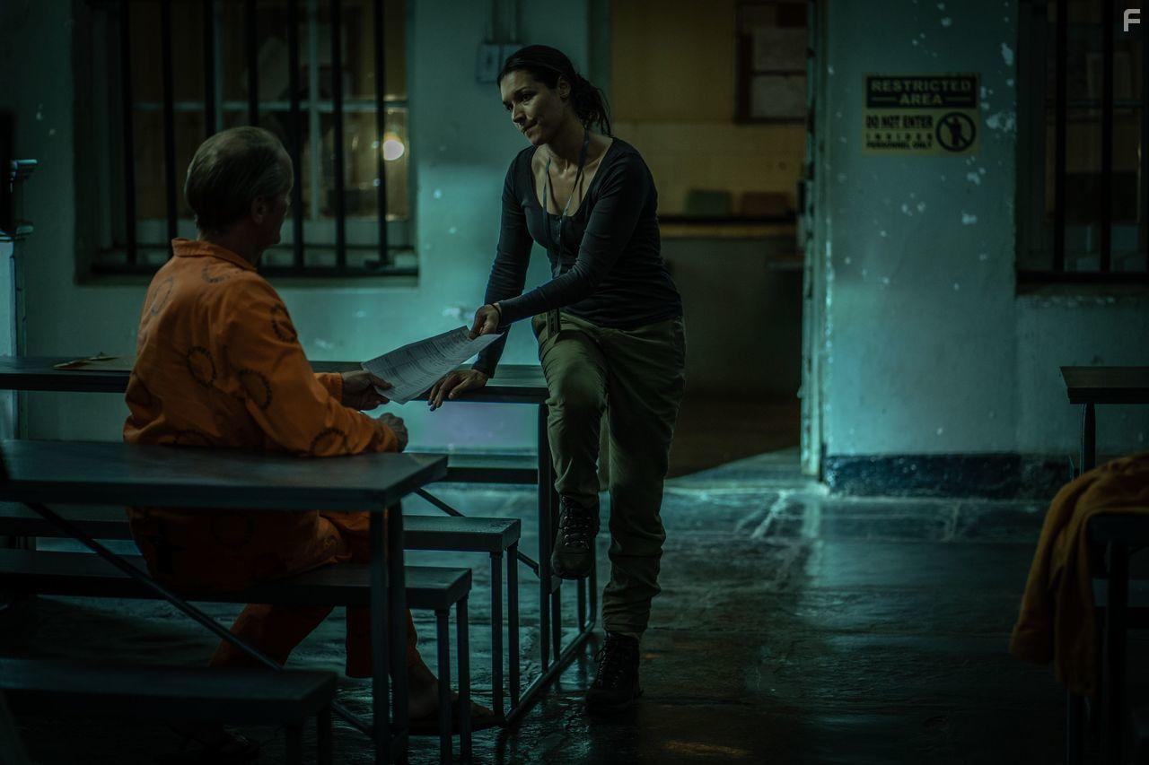 Kim Engelbrecht and Iain Glen in Reyka (2021)