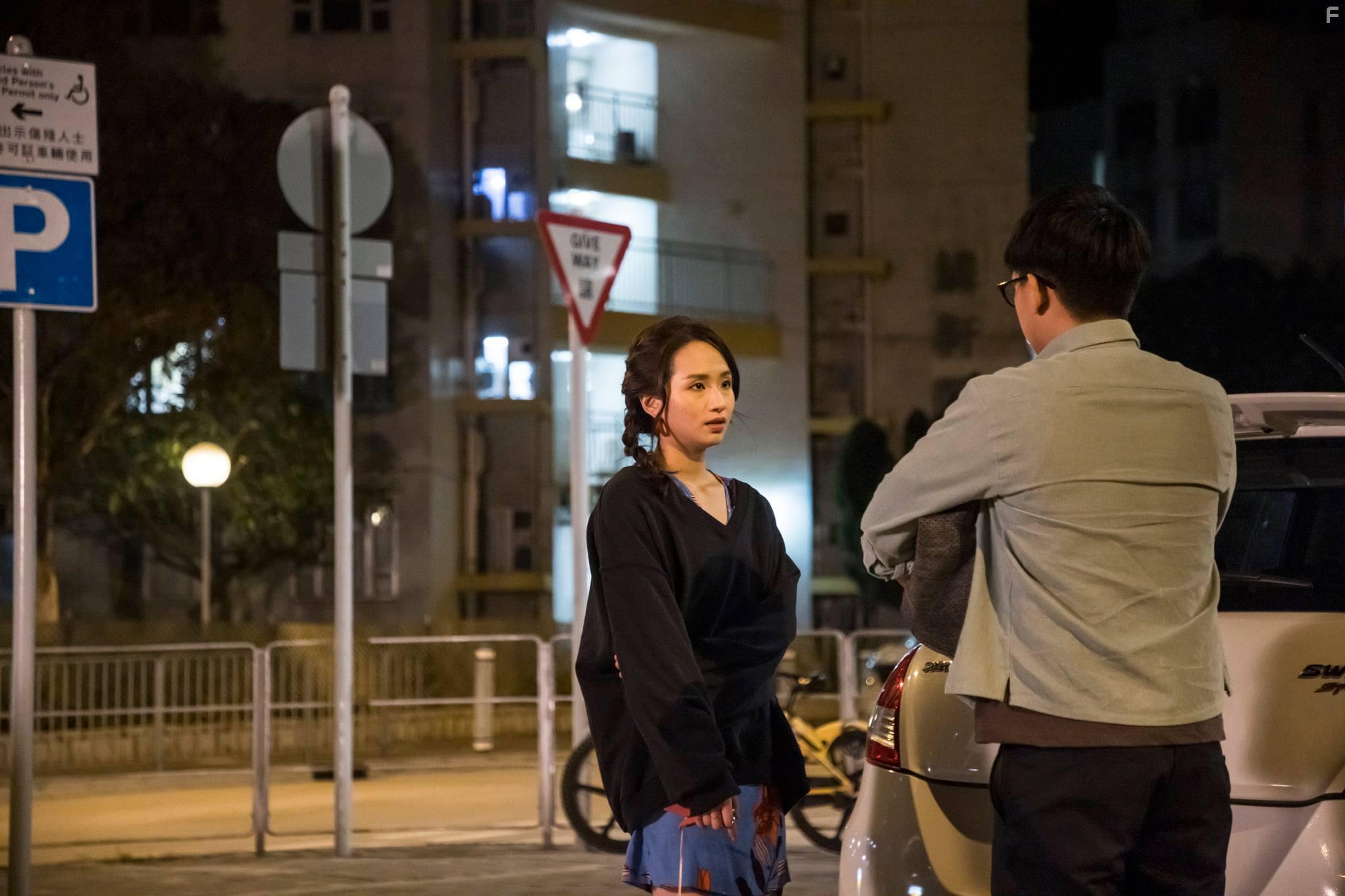 Ka-Ki Sham and Rachel Leung in Yun lou saan go lo (2021)