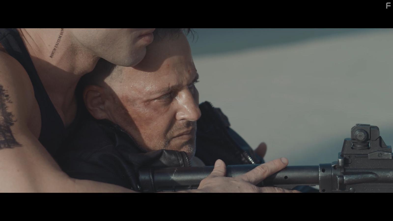 Louis Mandylor and Kristos Andrews in Breakout (2023)