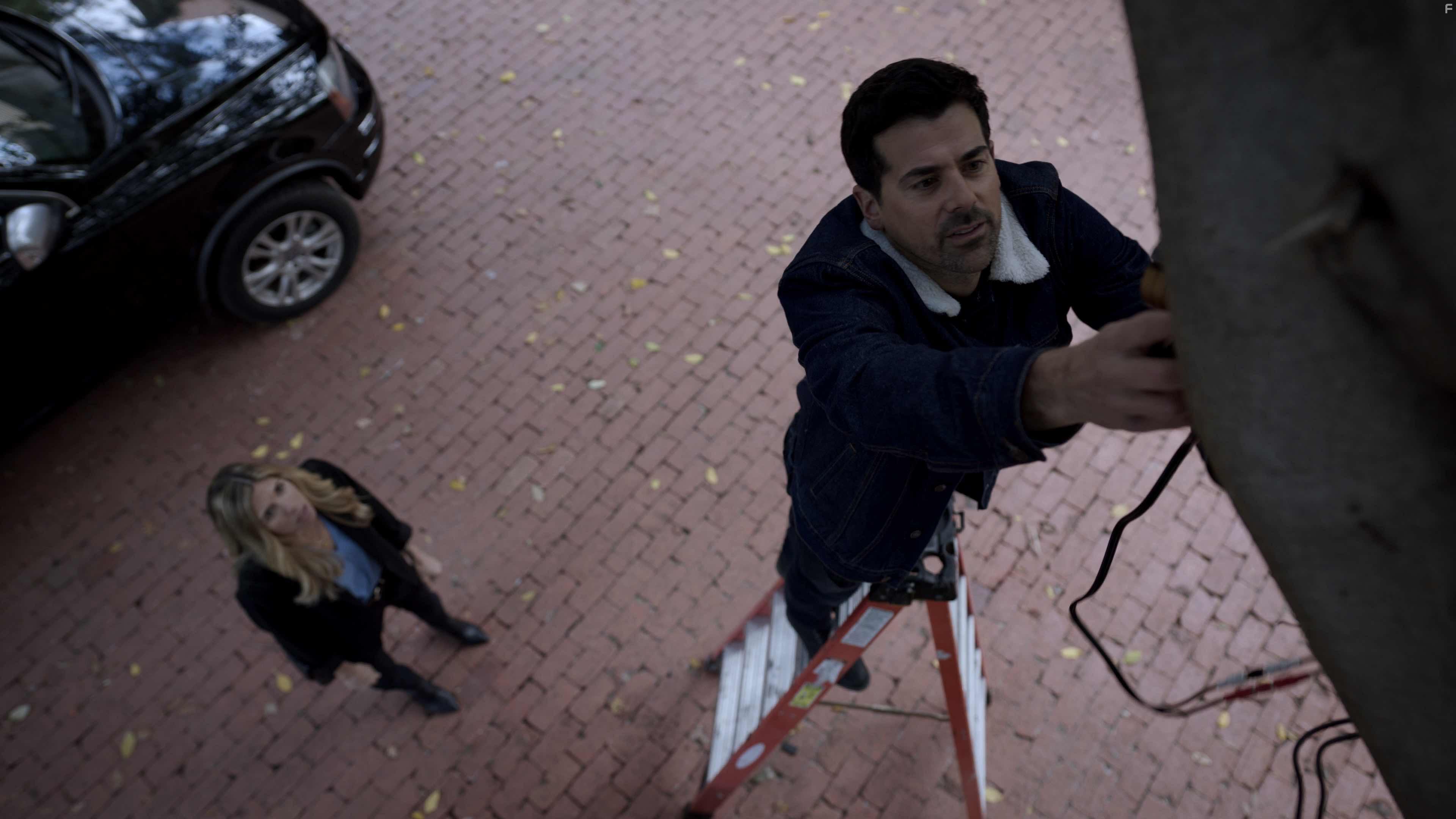 Andrea Bogart and Adam Huss in Home, Not Alone (2023)