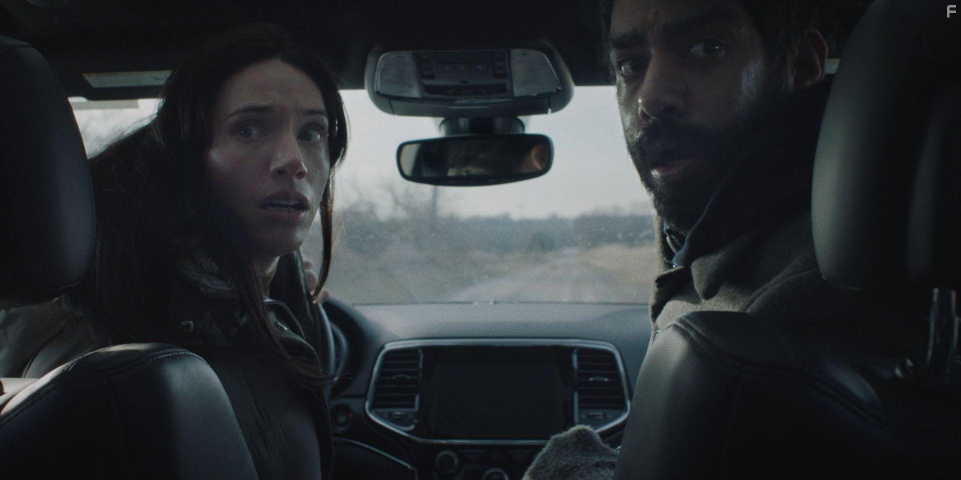 Rahul Kohli and Katie Parker in Next Exit (2022)