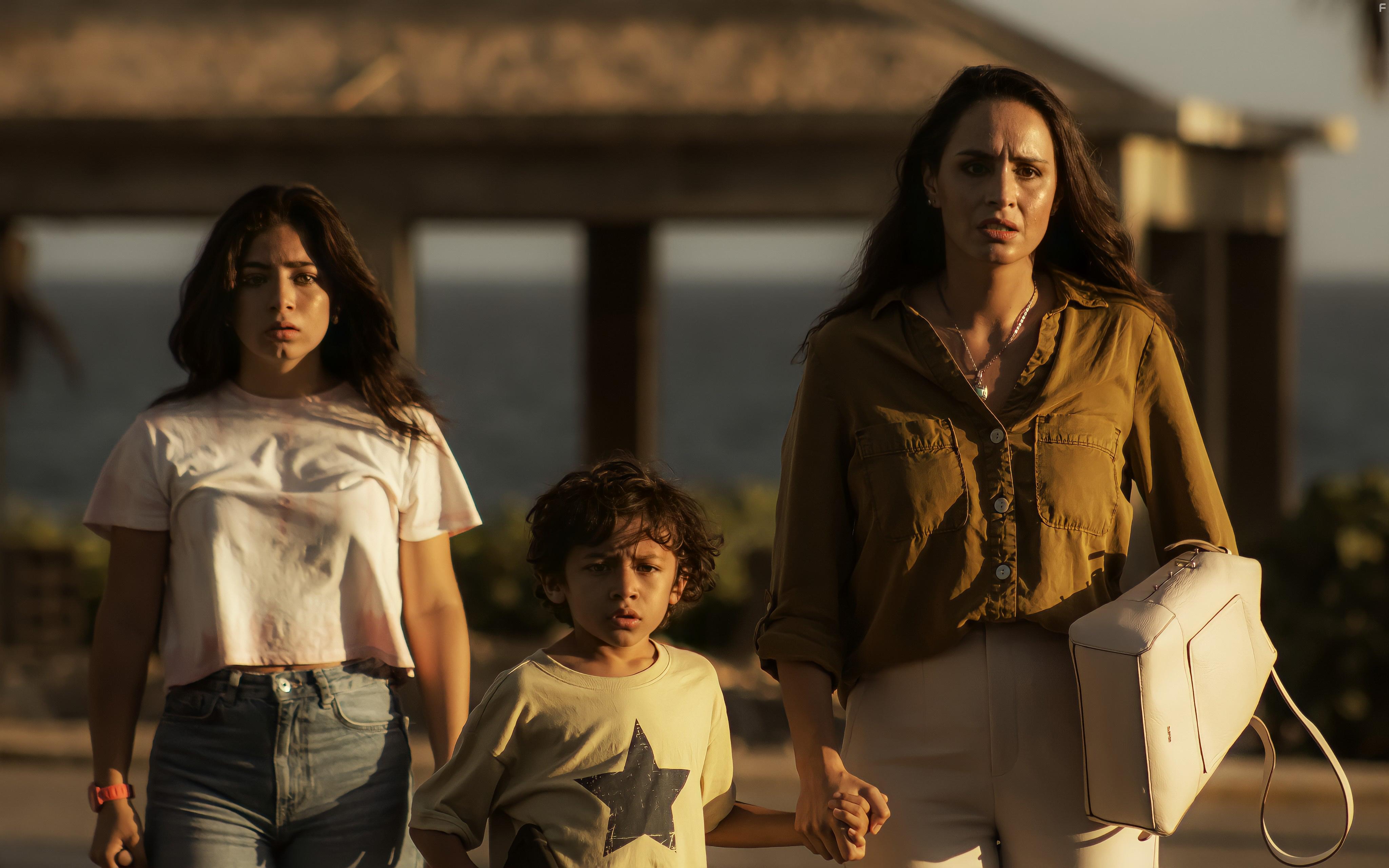Carlos Solrzano, Fernanda Urrejola, and Venus Ariel in The Black Demon (2023)