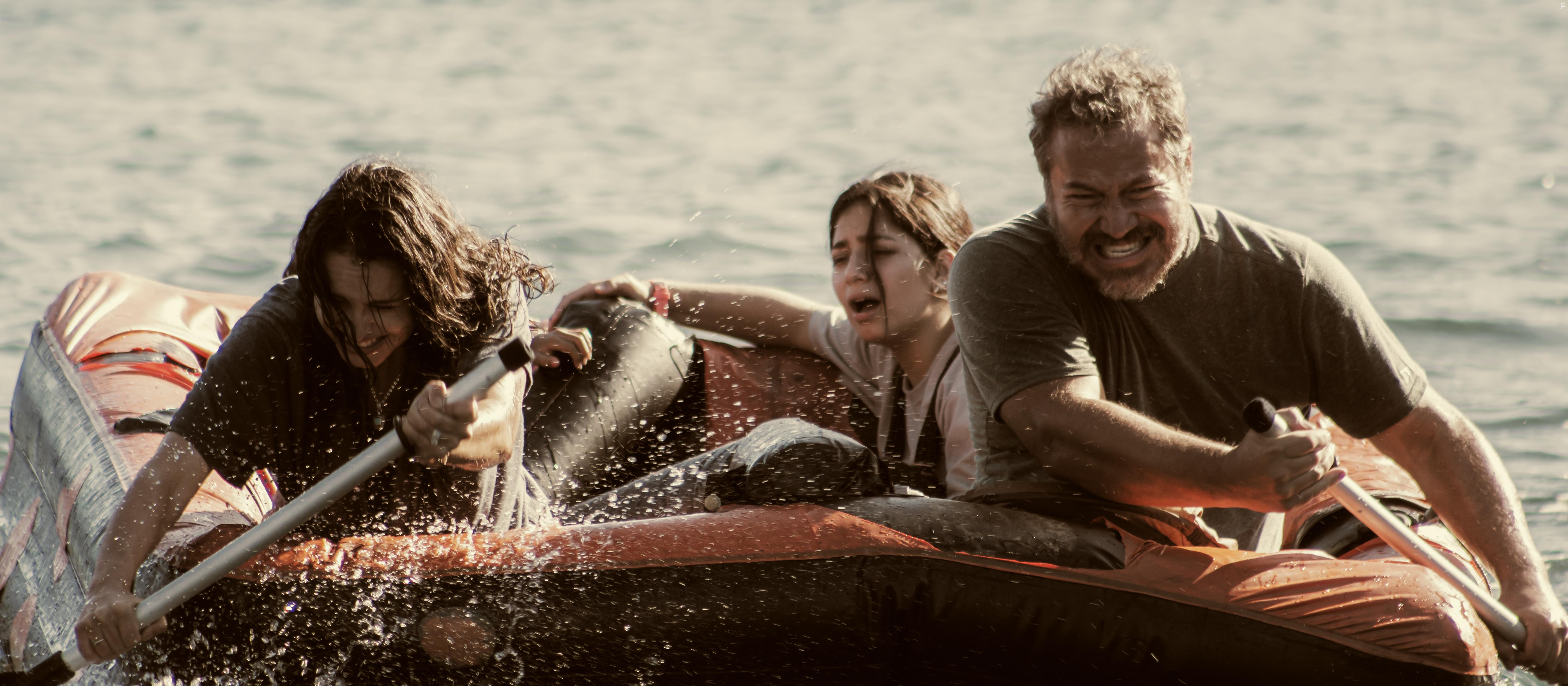 Julio Cesar Cedillo, Fernanda Urrejola, and Venus Ariel in The Black Demon (2023)