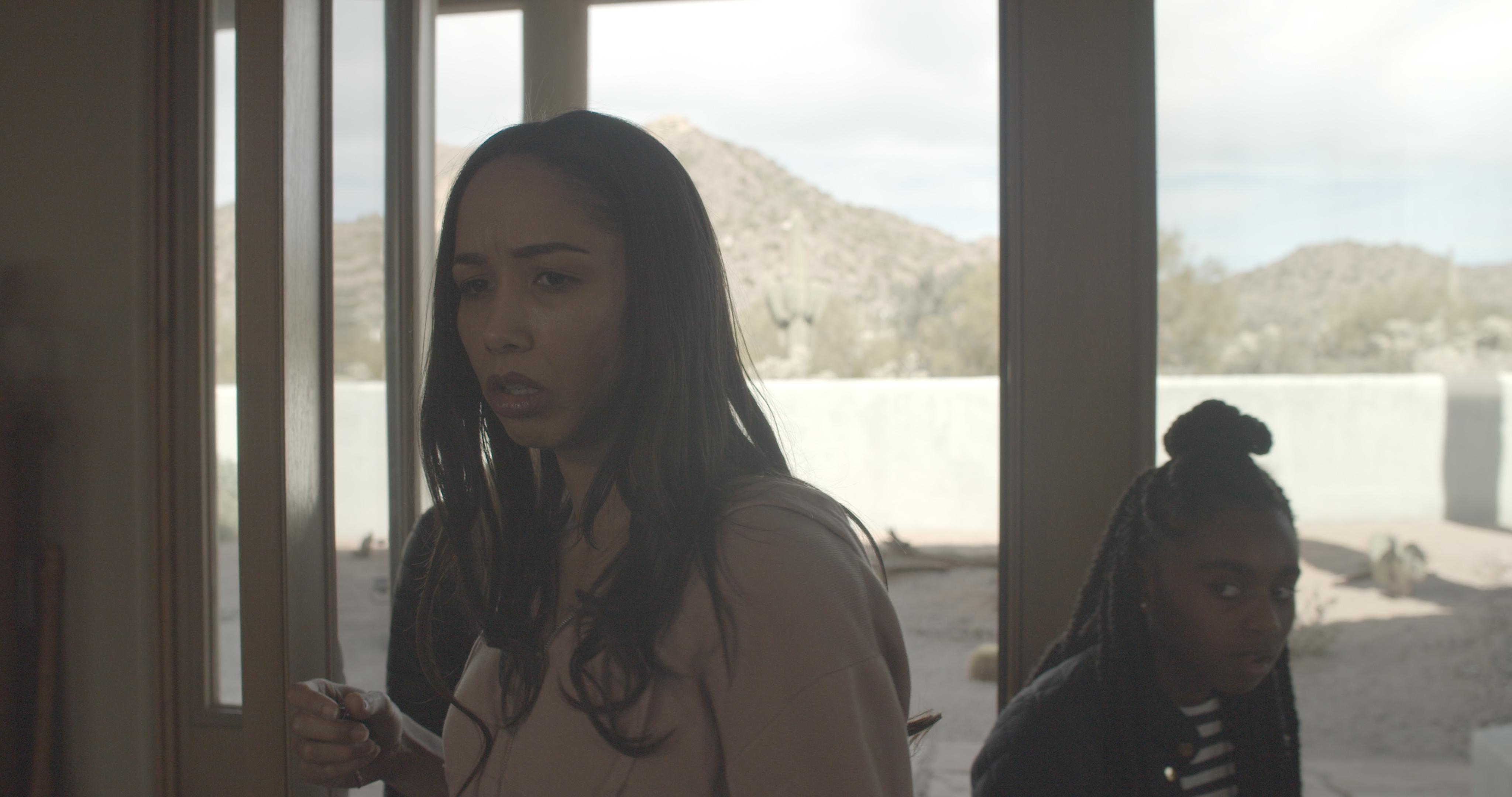 Tasha Conerly, Daijah Amir Toney, and Azariah Burnett in Controlled (2022)