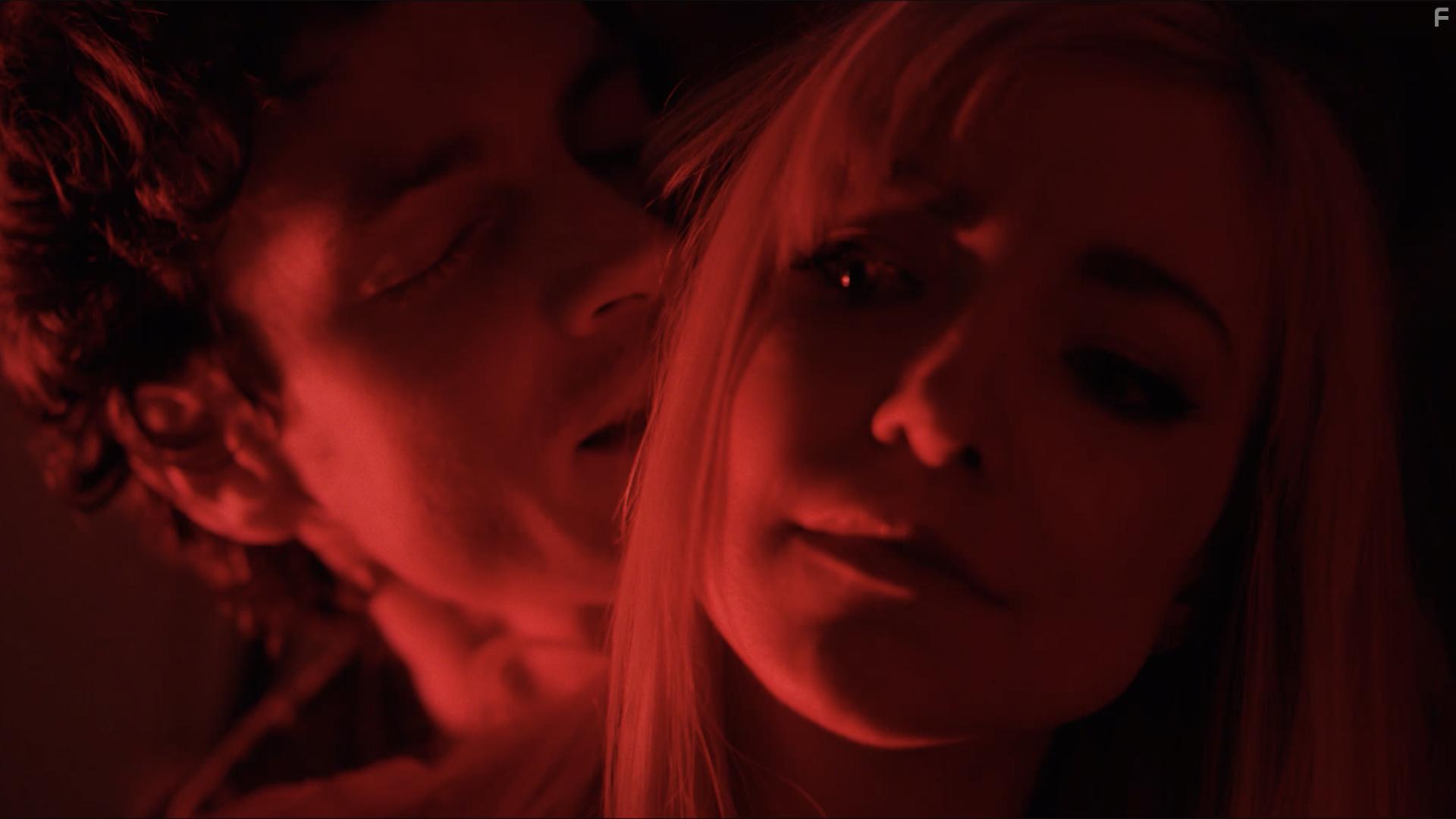 Luke Cook and Dani Barker in Follow Her (2022)