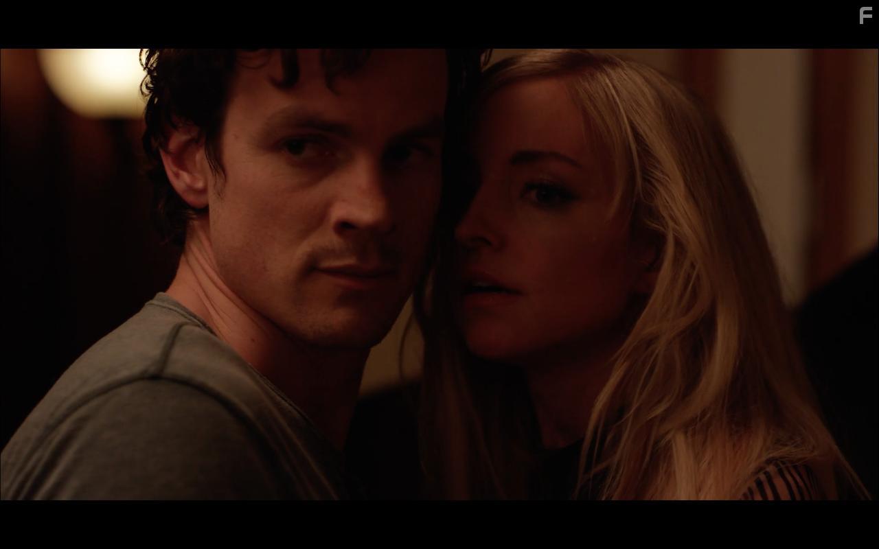 Luke Cook and Dani Barker in Follow Her (2022)