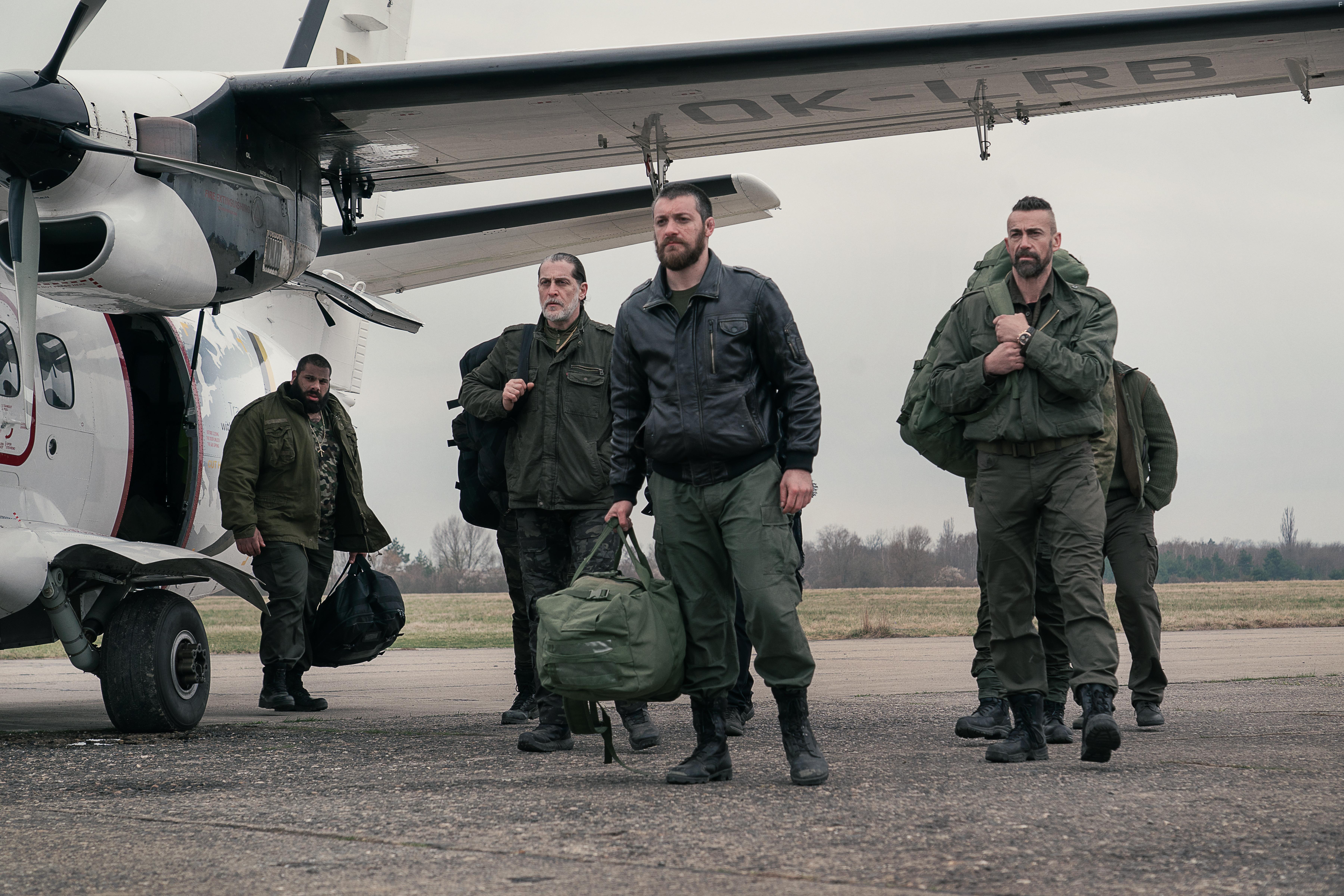 Daniel Bernhardt, George Lasha, Levan Saginashvili, and Tornike Gogrichiani in Extraction 2 (2023)