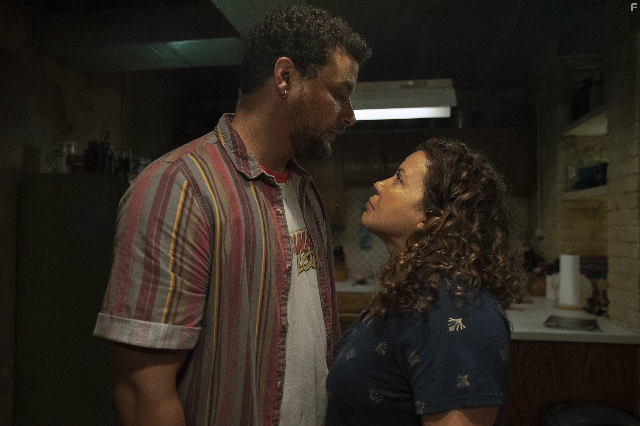 Justina Machado and Alejandro Hernandez in The Horror of Dolores Roach (2023)