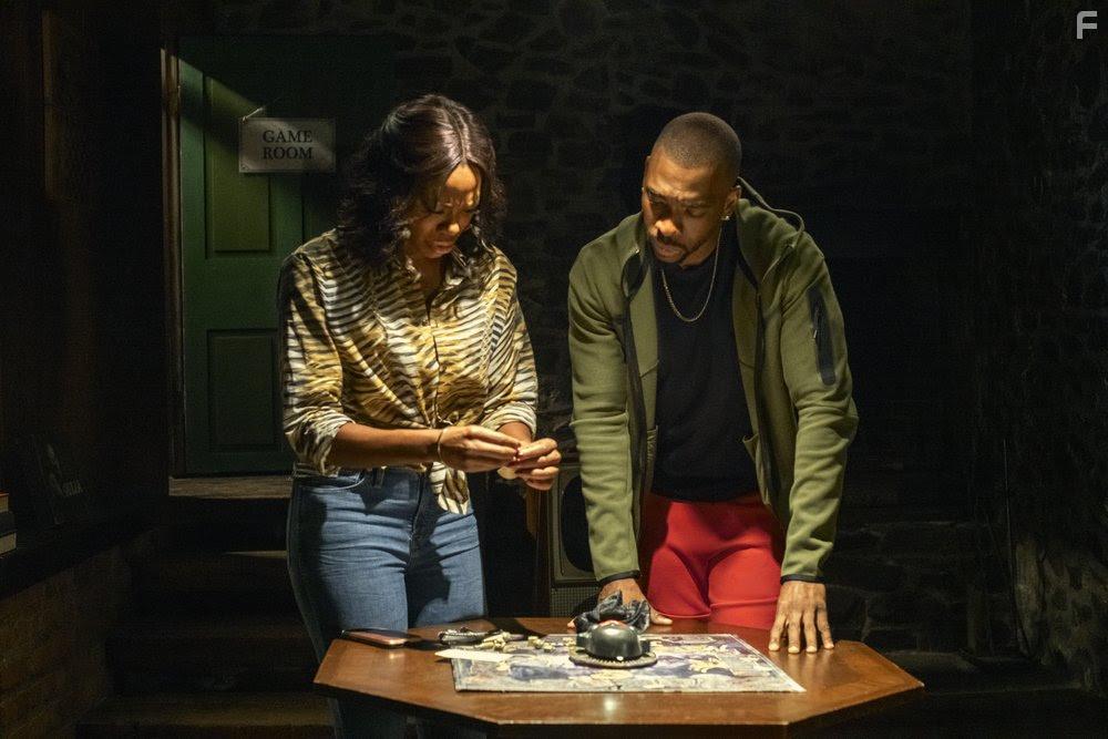 Jay Pharoah and Yvonne Orji in The Blackening (2022)