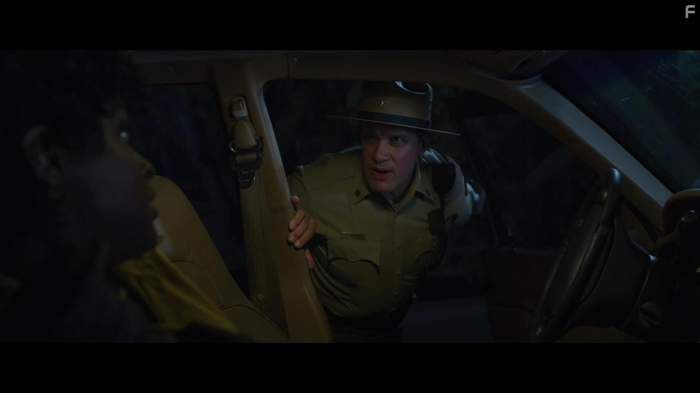 Diedrich Bader and Antoinette Robertson in The Blackening (2022)