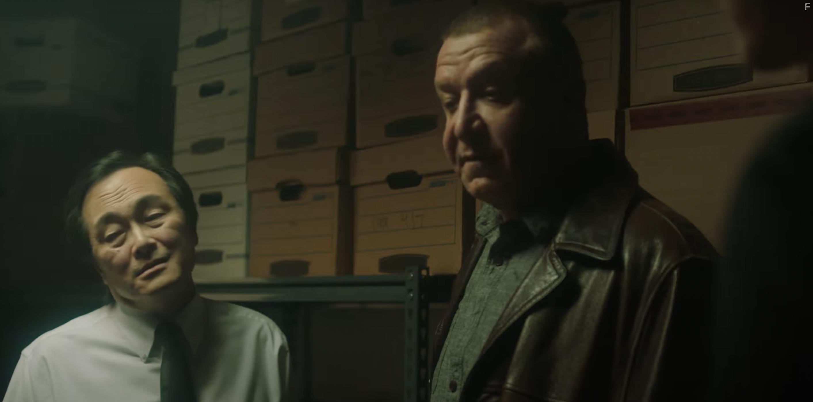 Ping Wu and Paul Rae in Year of the Detectives (2021)