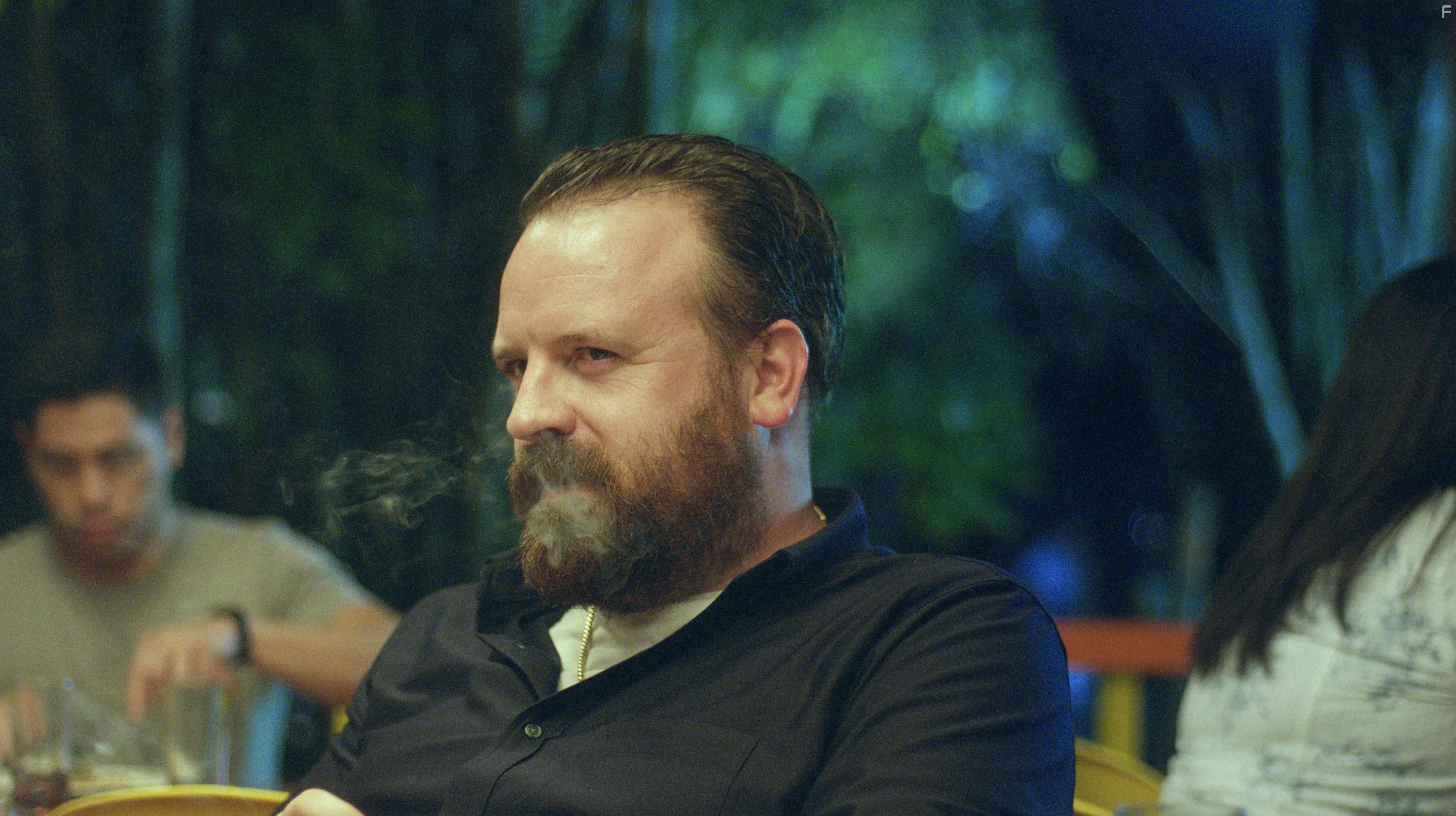 Simon Phillips in Escaping Paradise (2022)