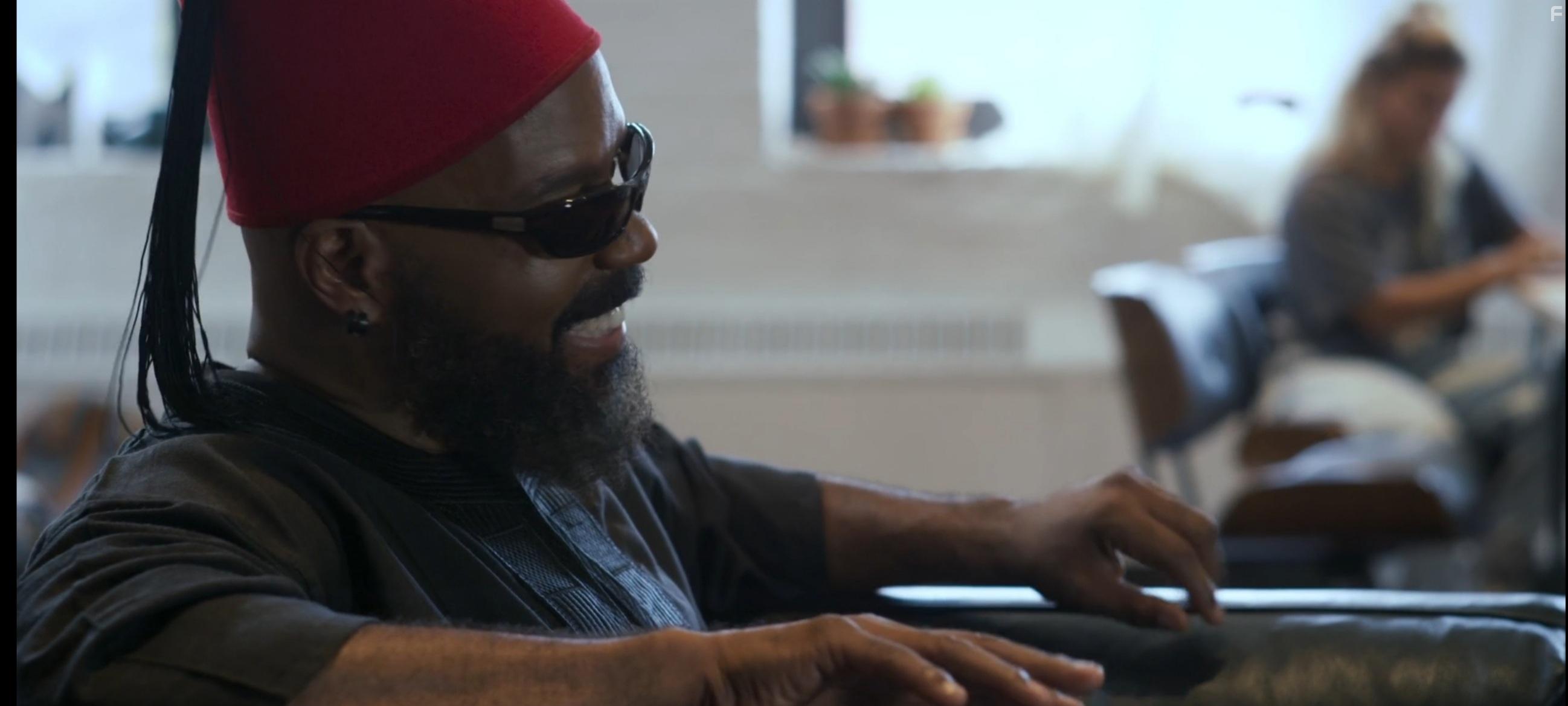 Shiek Mahmud-Bey and Christine Cottone in Crash the System (2022)