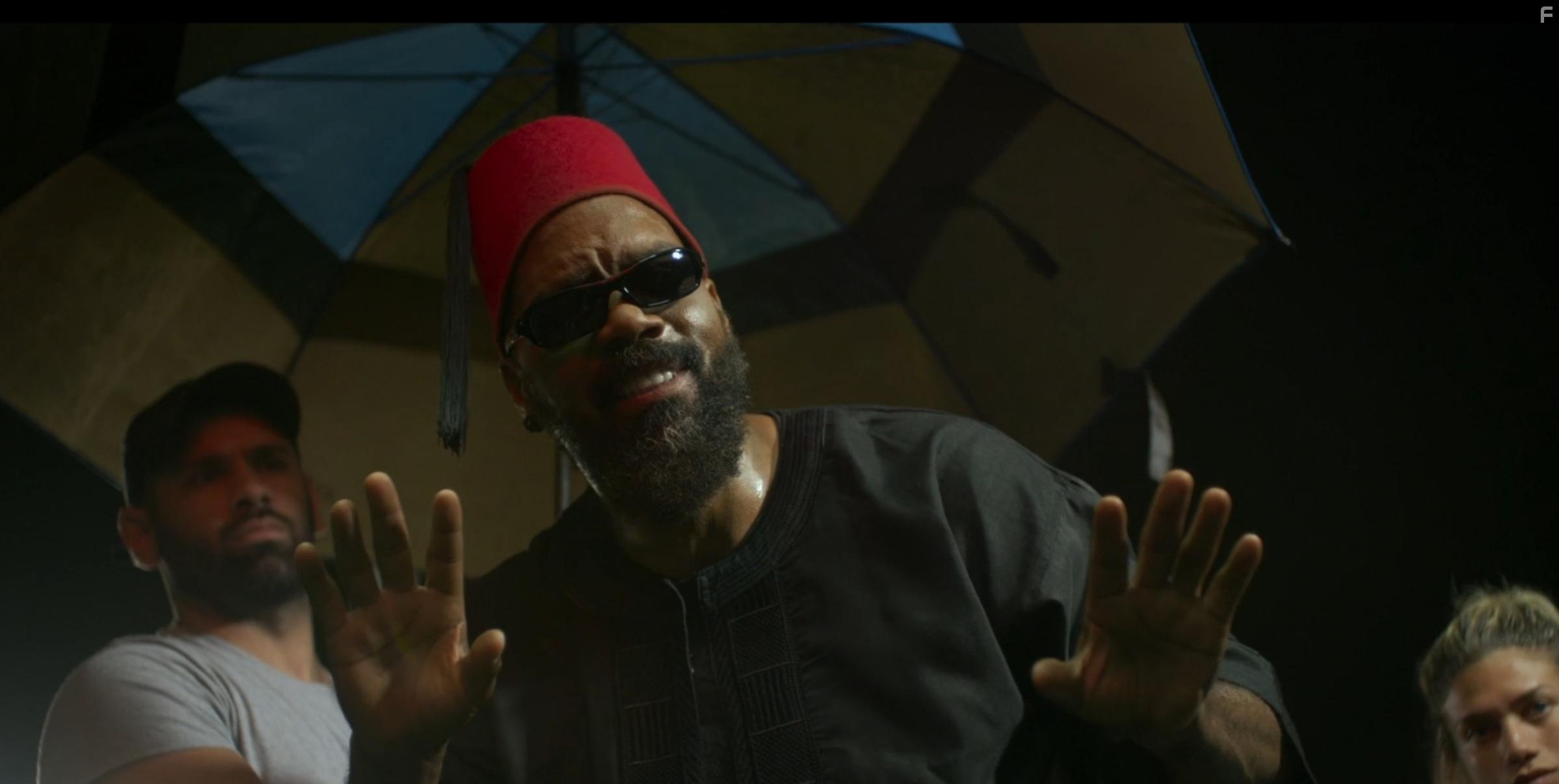 Shiek Mahmud-Bey, Christine Cottone, and Michael Maugeri in Crash the System (2022)