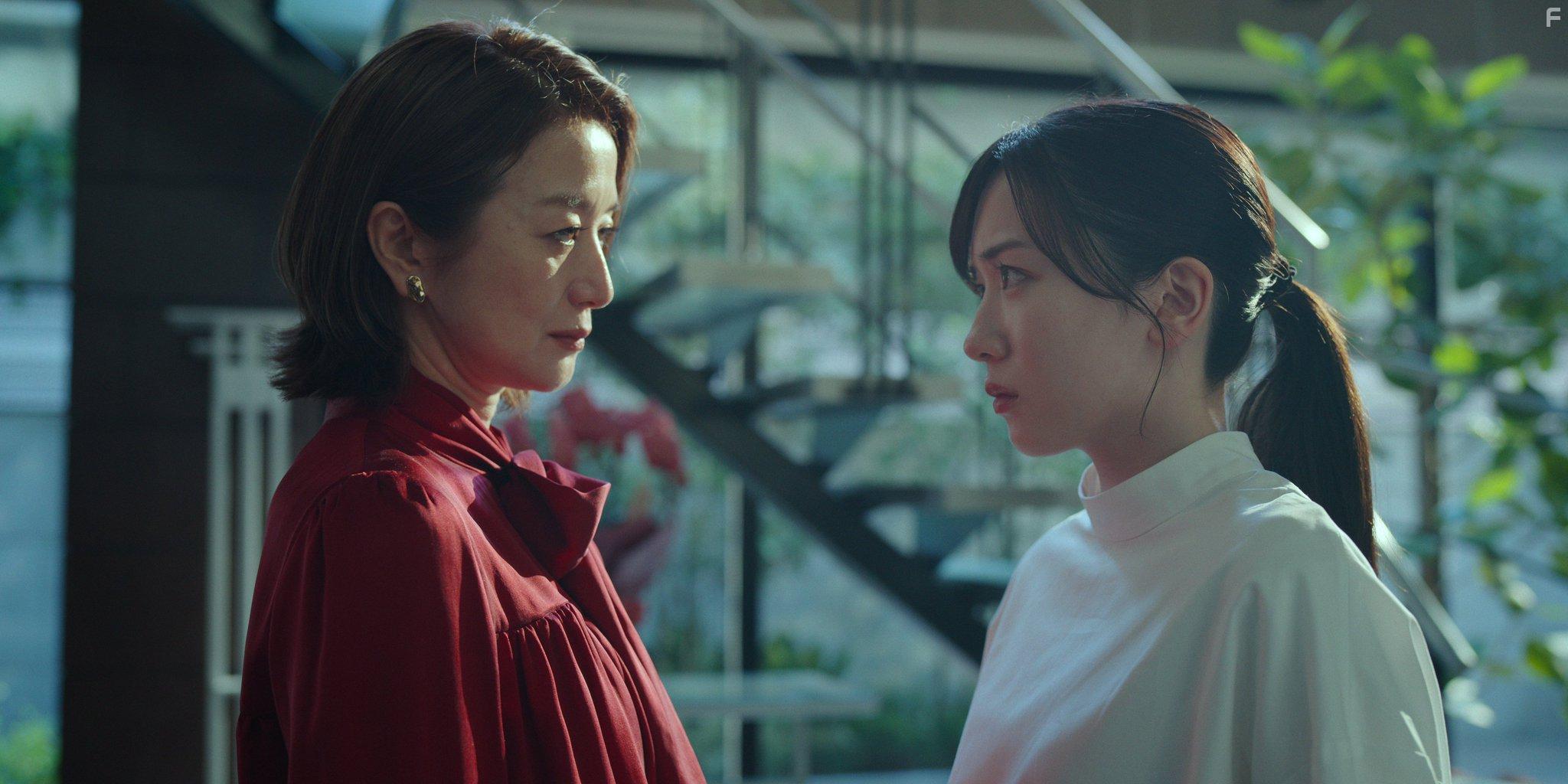 Охваченный пламенем дом Митарай