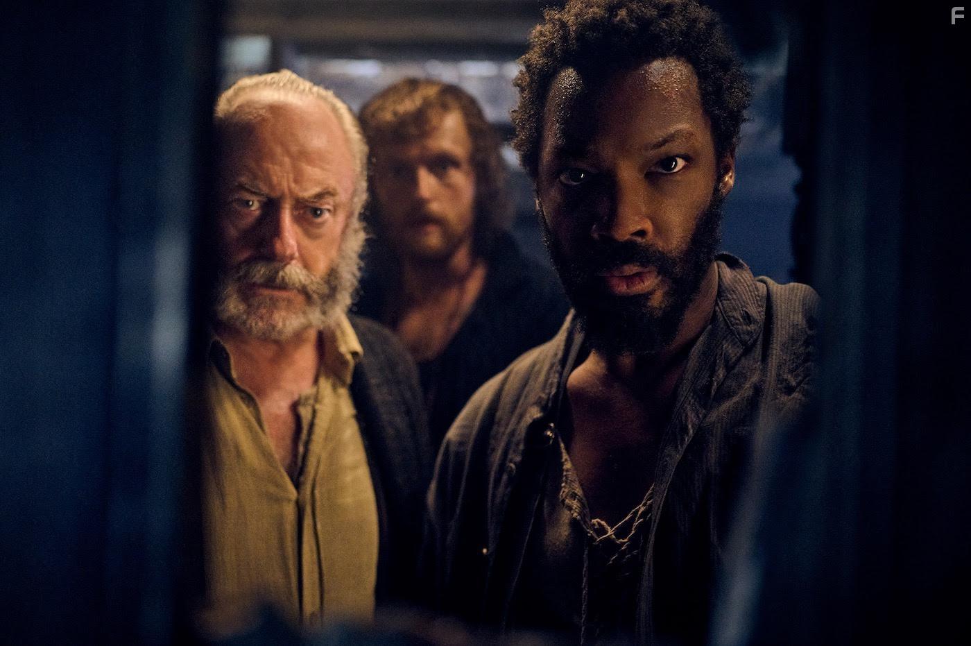 Liam Cunningham, Corey Hawkins, and Chris Walley in The Last Voyage of the Demeter (2023)