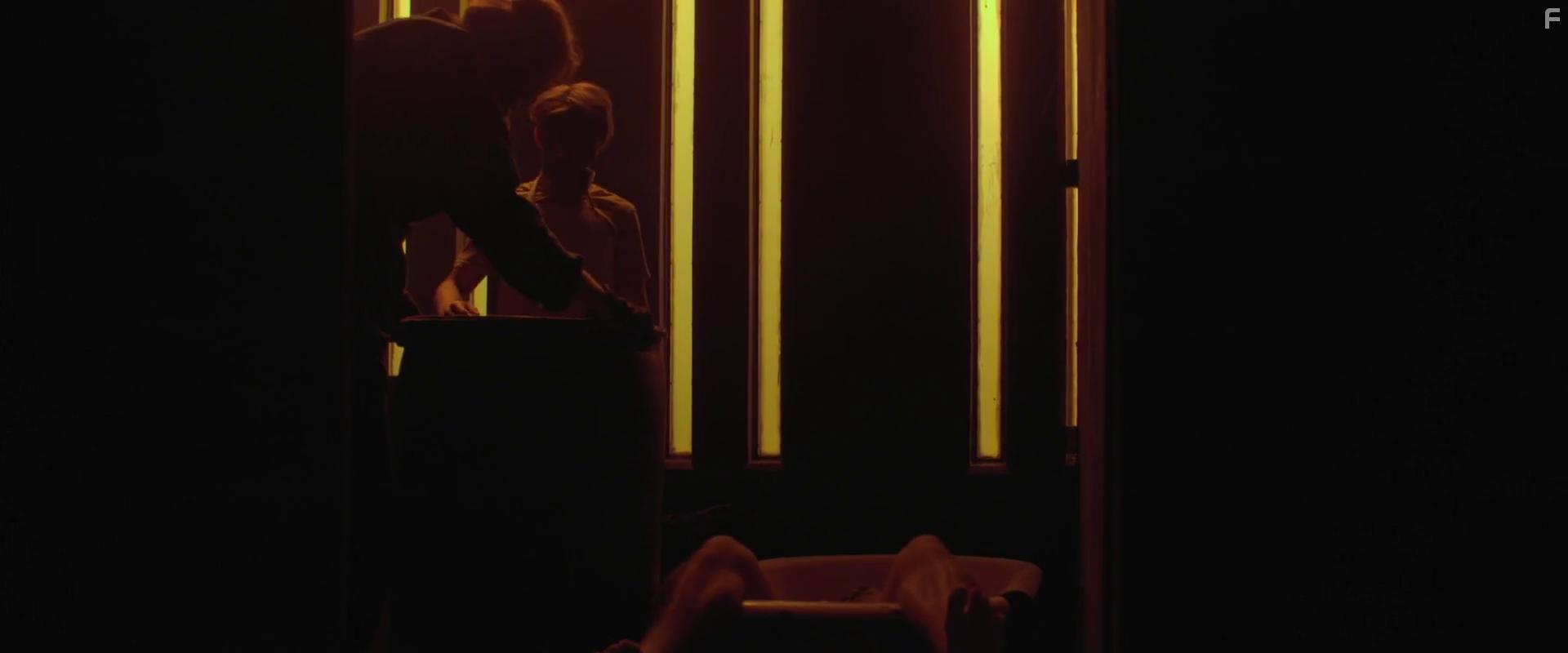 Erika Ervin and Tyler Sanders in The Price We Pay (2022)