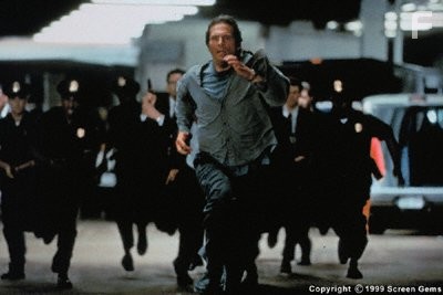 Michael's investigation turns into a chase through the streets of Washington D.C.