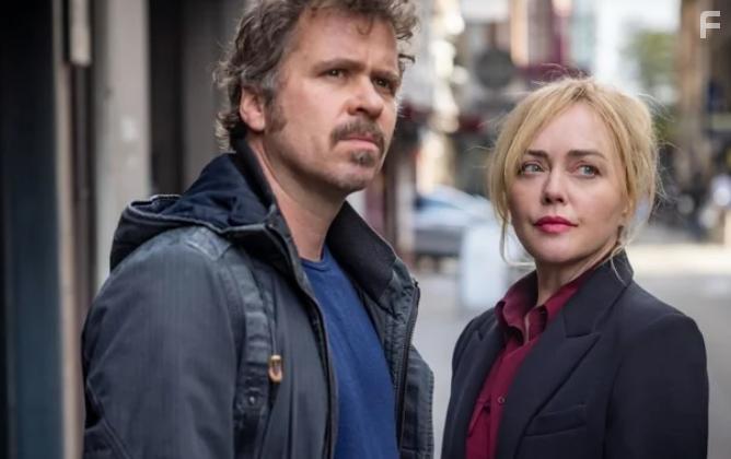 Angeline Ball and Wouter Hendrickx in Hidden Assets (2021)