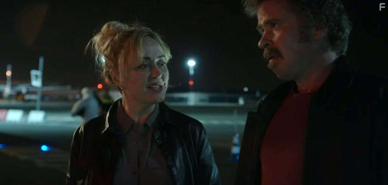 Angeline Ball and Wouter Hendrickx in Hidden Assets (2021)