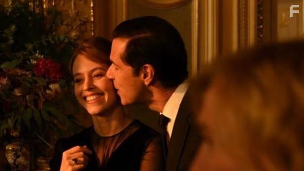 Melvil Poupaud and Lou de Lage in Coup de chance (2023)