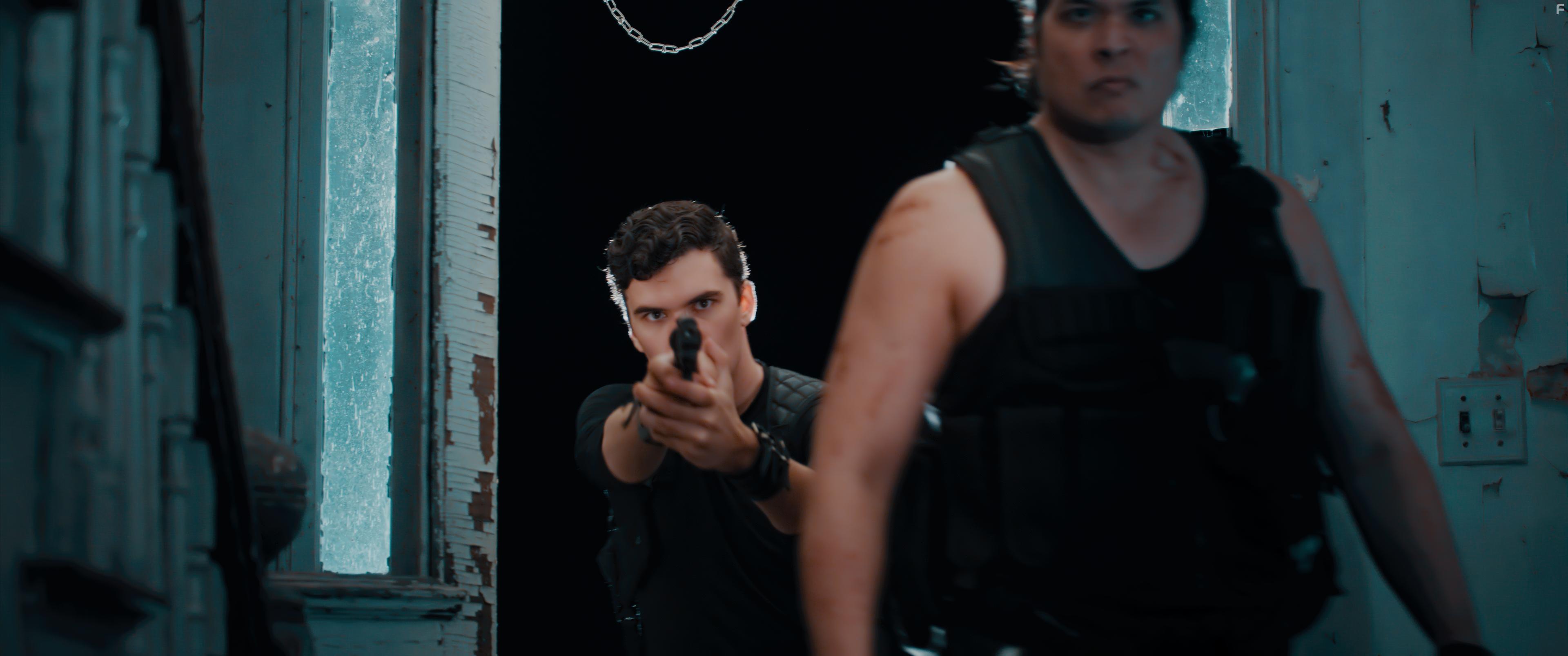 Wayne W. Johnson and Trey Harrison in Johnny Z (2023)