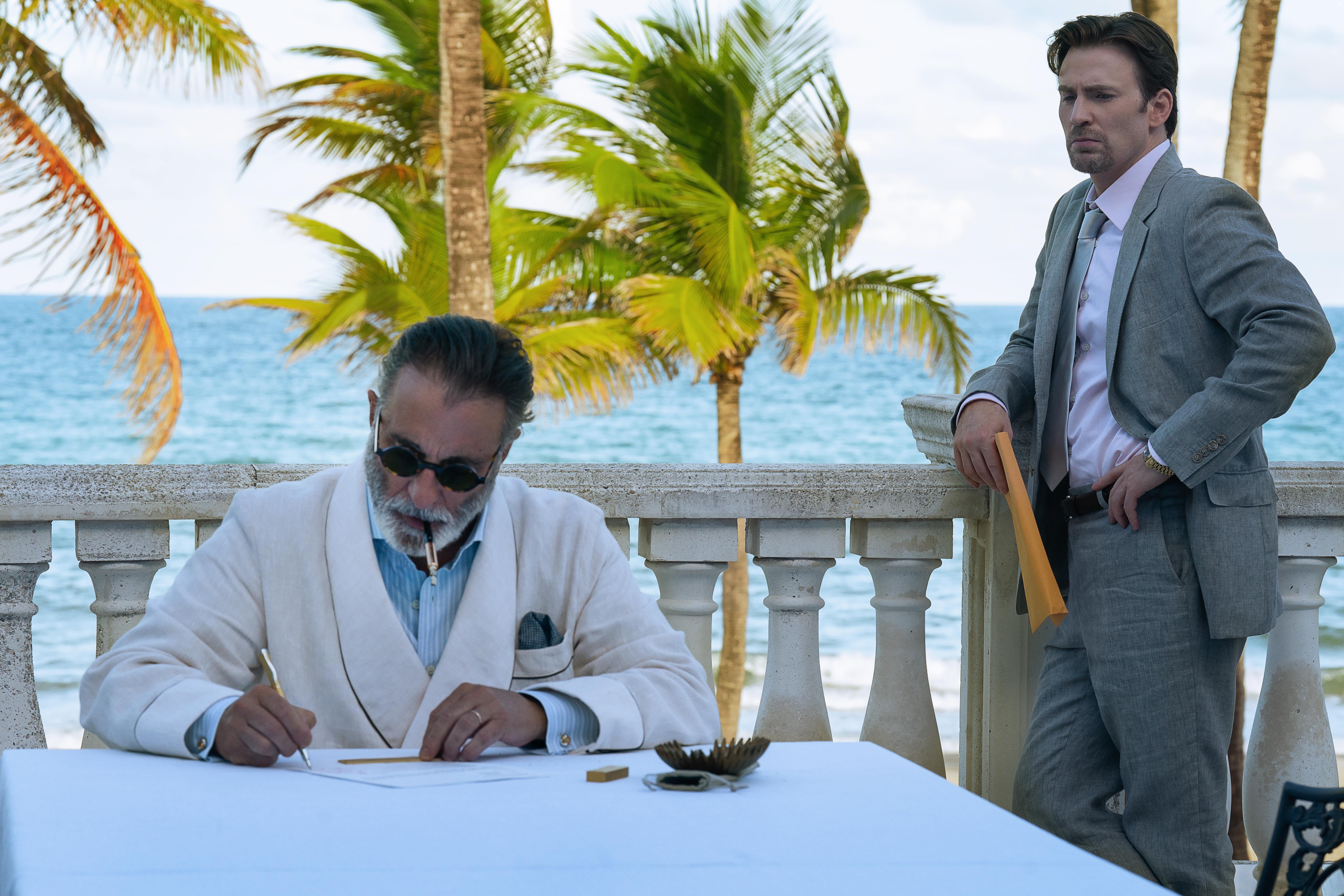 Andy Garcia and Chris Evans in Pain Hustlers (2023)