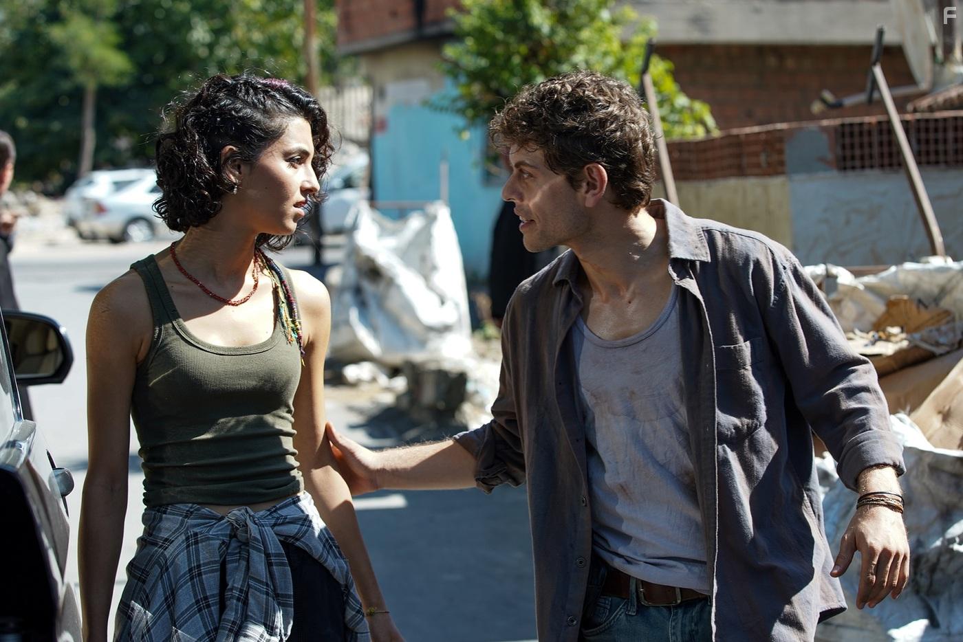 Rojbin Erden and Sezer Aricay in Yabani (2023)