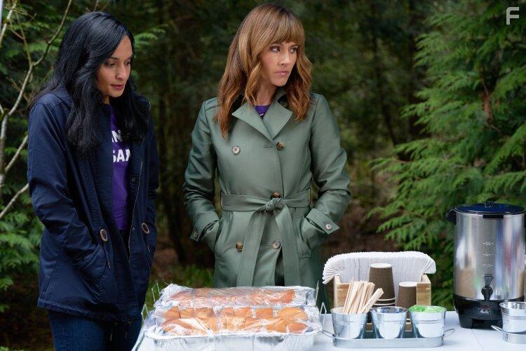Nikki Deloach and Sunita Prasad in Curious Caterer: Fatal Vows (2023)