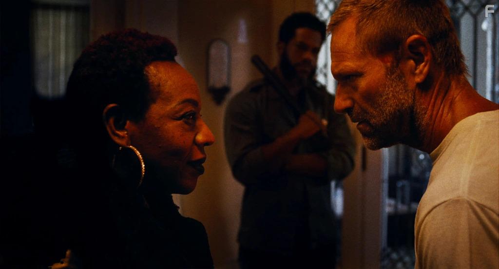 Aaron Eckhart and Marianne Jean-Baptiste in Rumble Through the Dark (2023)