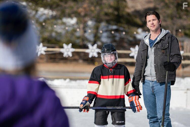 Kairo Ryan Ellis, Kim Matula, and Kevin McGarry in Checkin' It Twice (2023)