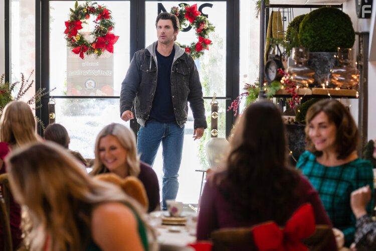 Desiree Zurowski, Kevin McGarry, and Brittany Mitchell in Checkin' It Twice (2023)