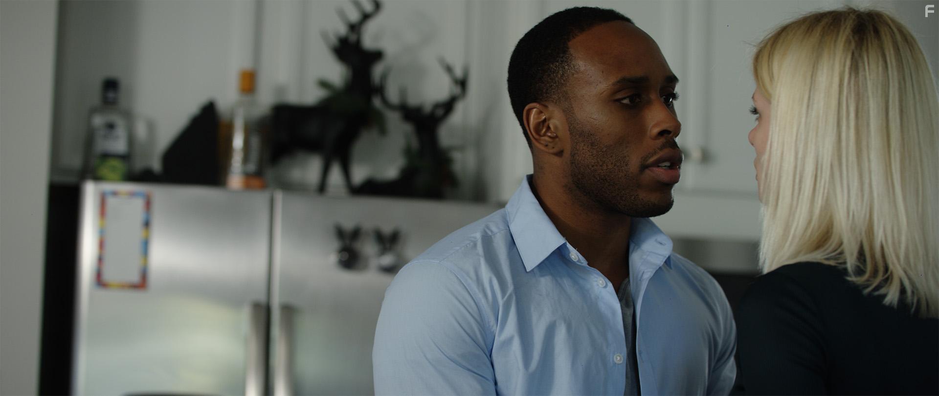 Marquis Ransom and Martina Karra in By Deception (2022)