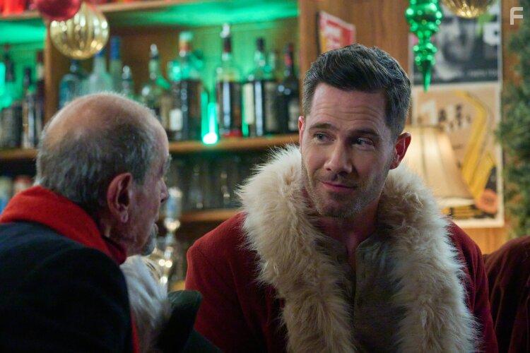 Luke Macfarlane in Catch Me If You Claus (2023)