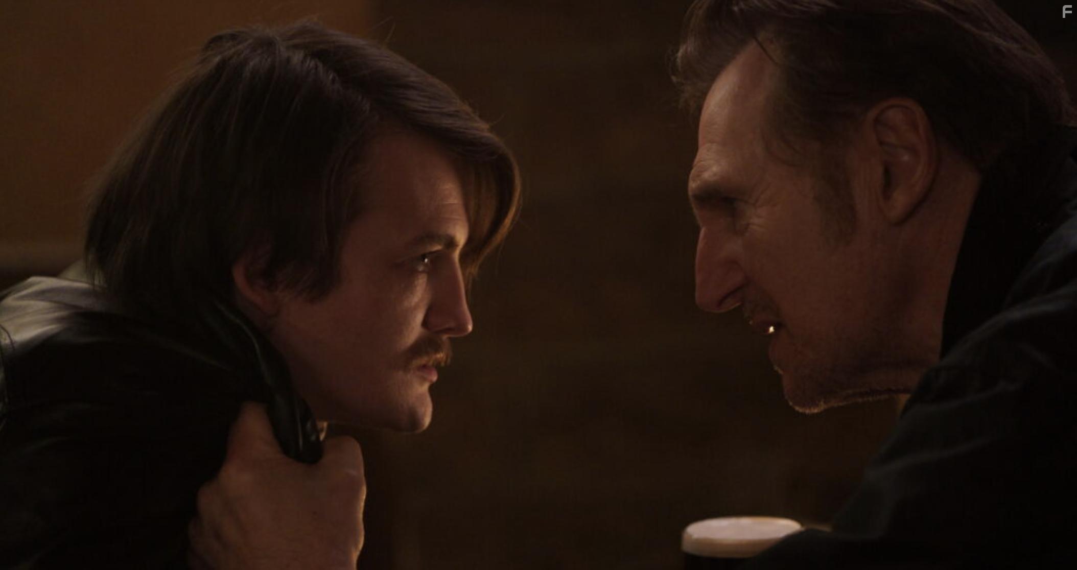 Liam Neeson and Jack Gleeson in In the Land of Saints and Sinners (2023)