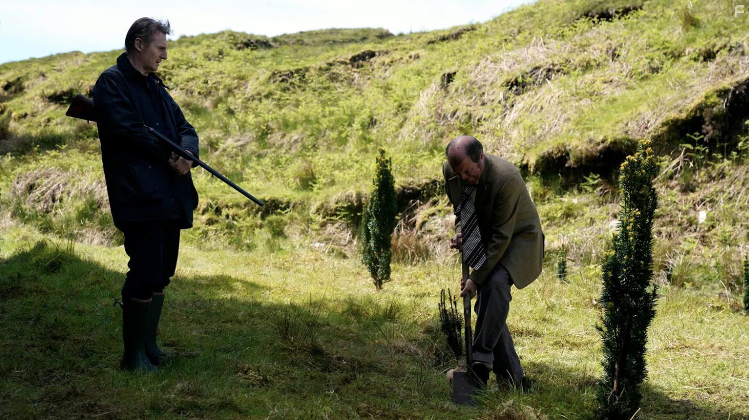 Liam Neeson and Mark O'Regan in In the Land of Saints and Sinners (2023)