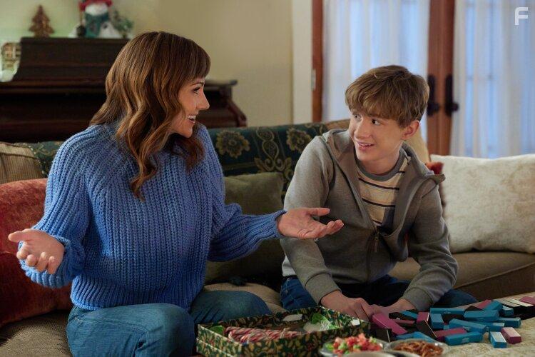 Nikki Deloach and Aias Dalman in A World Record Christmas (2023)