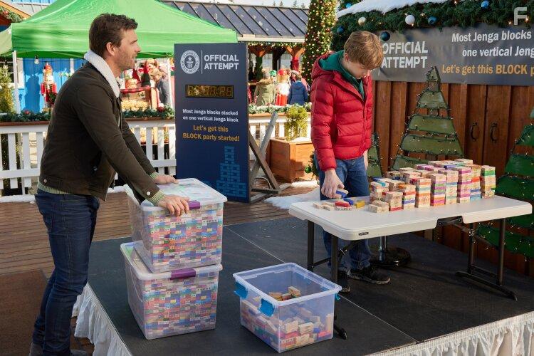 Lucas Bryant and Aias Dalman in A World Record Christmas (2023)