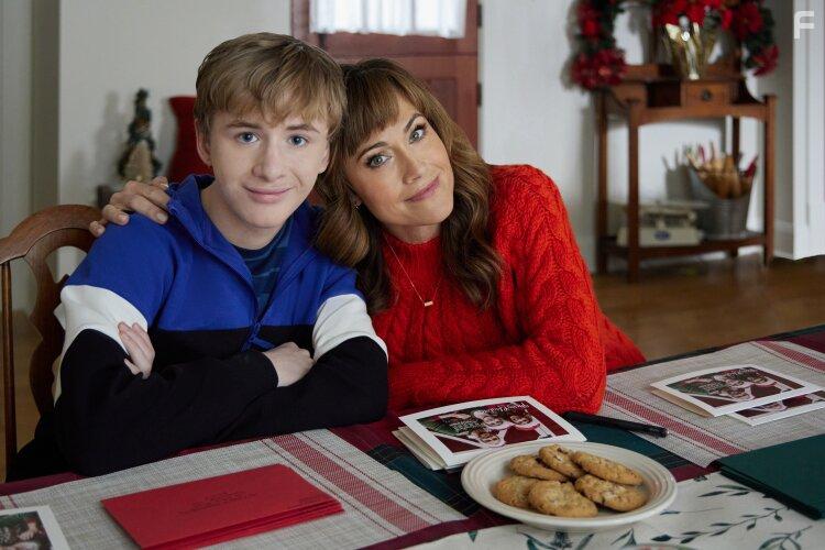 Nikki Deloach and Aias Dalman in A World Record Christmas (2023)