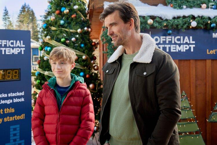 Lucas Bryant and Aias Dalman in A World Record Christmas (2023)